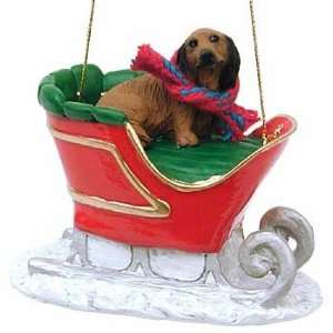  Longhaired Red Doxie in a Sleigh Christmas Ornament