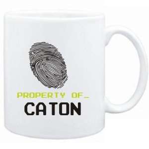  Mug White  Property of _ Caton   Fingerprint  Female 