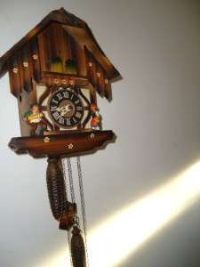 HERE WE HAVE A BEAUTIFUL GERMAN HAND MADE CUCKOO CLOCK WITH SWISS 