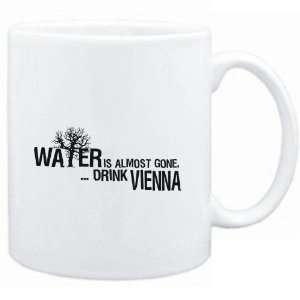  Mug White  Water is almost gone  drink Vienna  Drinks 