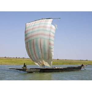 Niger Inland Delta, A Pirogue under Sail on the Niger River Between 