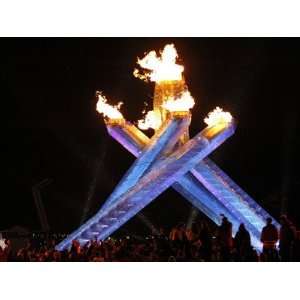 Spectators Surround the Olympic Flame at the Vancouver 2010 Olympics 