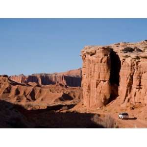 Truck Drives Through the Desert and Cliffs of Utha, Capitol Reef 
