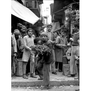  Egyptian Youths Gathered in Street Aroun Boy Carrying 