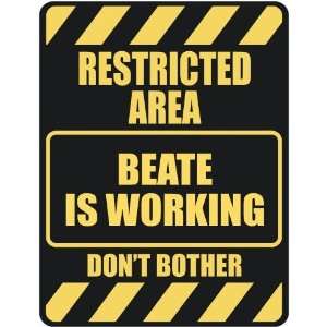   RESTRICTED AREA BEATE IS WORKING  PARKING SIGN