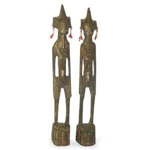  Tasi and Nyruie, statuettes (pair)