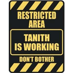   RESTRICTED AREA TANITH IS WORKING  PARKING SIGN