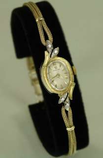 14k SOLID GOLD Omega ladies watch, 14k SOLID GOLD CLASP, 4 Genuine 