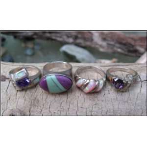  Four Brand New Sterling Silver Rings in a Size 7 