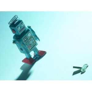  Gray Toy Plastic Robot Walking Towards Key Mechanism 