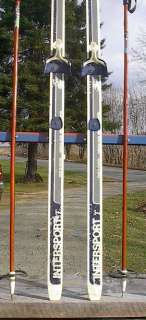 The skis are signed KARHU. Measures 70 (180 cm) long. Have 3 pin 75 