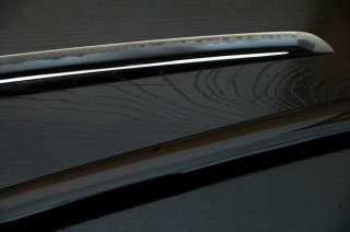 The katana is characterized by its distinctive appearance a curved 
