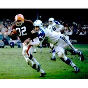  Jim Brown 16x20 Breaking Tackle vs. Cowboys Sports 