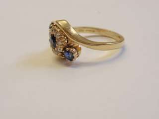 VINTAGE 1970S GOLD SAPPHIRE DIAMOND CLUSTER TWIST RING  