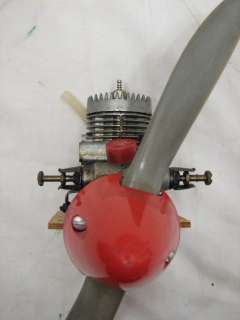 Fox 25 model airplane engine with mounting board and prop. Moves OK 