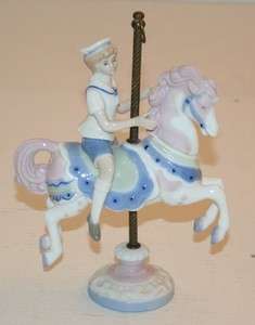 Sebastian Porcelain Child on Carousel Horse Figurine  