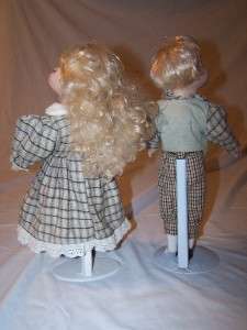 This is a cute pair of porcelain Dolls.
