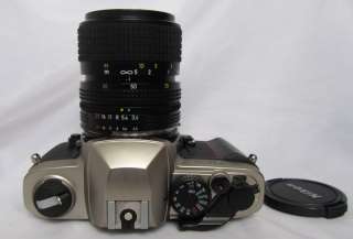 EXC Nikon FM10 35mm SLR Film Camera with 35 70mm Lens  