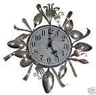 Silver Plate Tortured Silverware Clock by Diane Markin