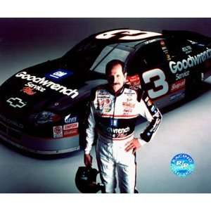  Dale Earnhardt portrait in front of car holding helmet 