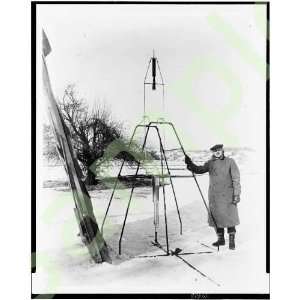  Scientist, Dr. Robert H. Goddard, posed with a rocket 