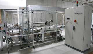 IMANPACK HORIZONTAL CASE PACKER/CARTONING MACHINE  