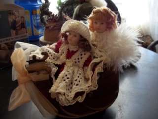 Xmas Porcelain Dolls in Victorian Sled  